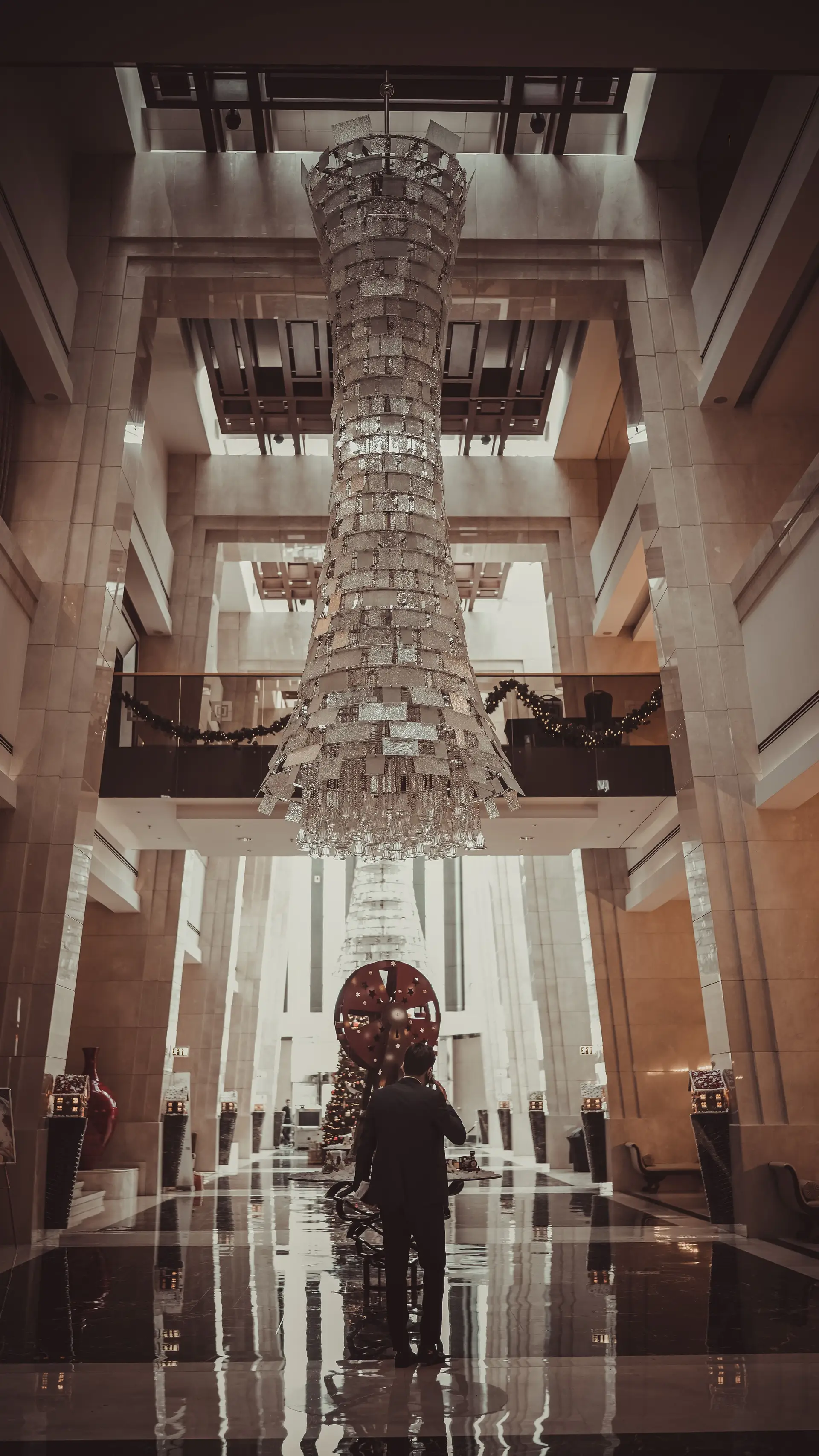 Refined hotel lobby with architectural brass details